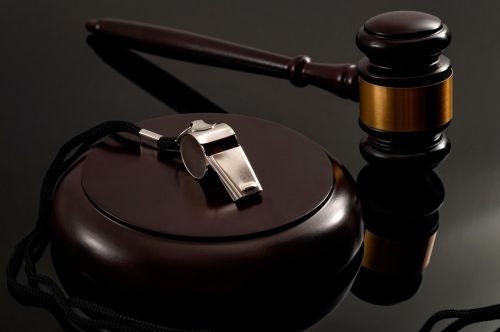 Image of a gavel with a whistle